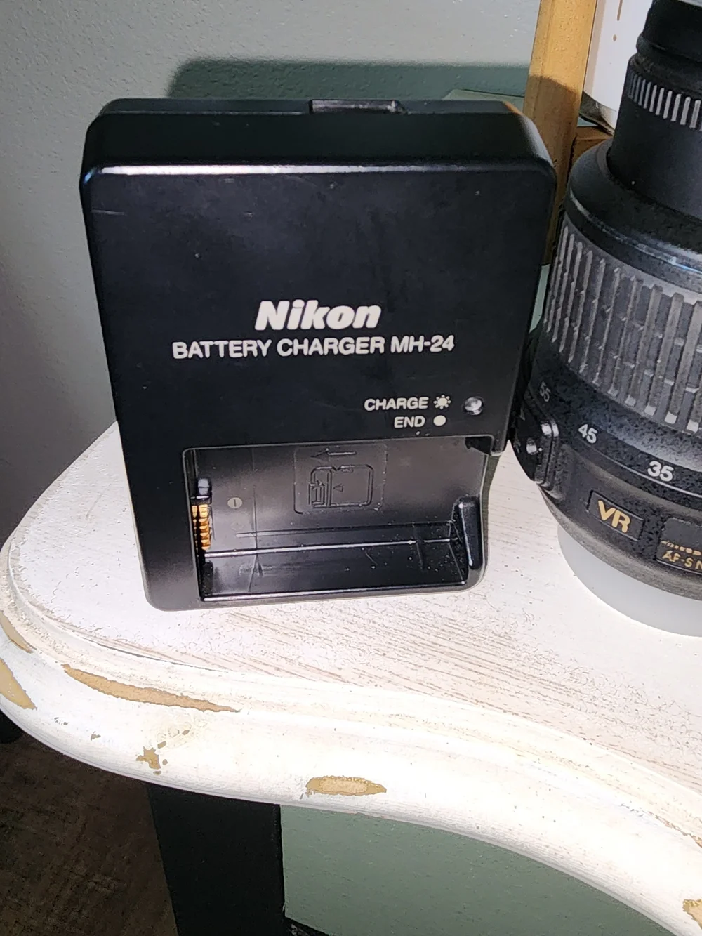 Nikon black DSLR Camera Body with Two Black Zoom Lenses